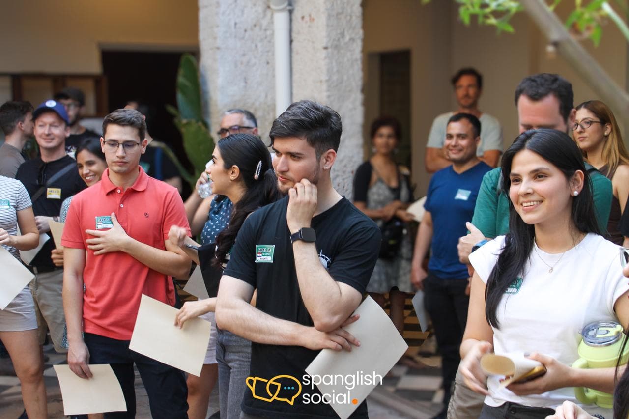 Spanglish language exchange event moment